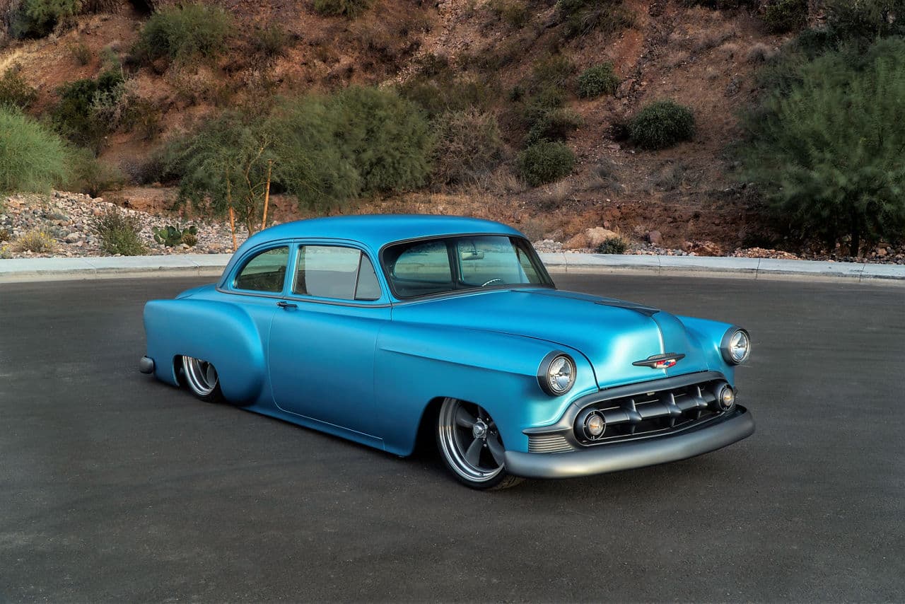 Side profile of 1953 Chevrolet 150 Custom Coupe with wheels