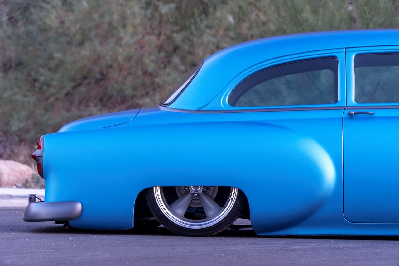 Rear view of 1953 Chevrolet 150 Custom Coupe with wheels