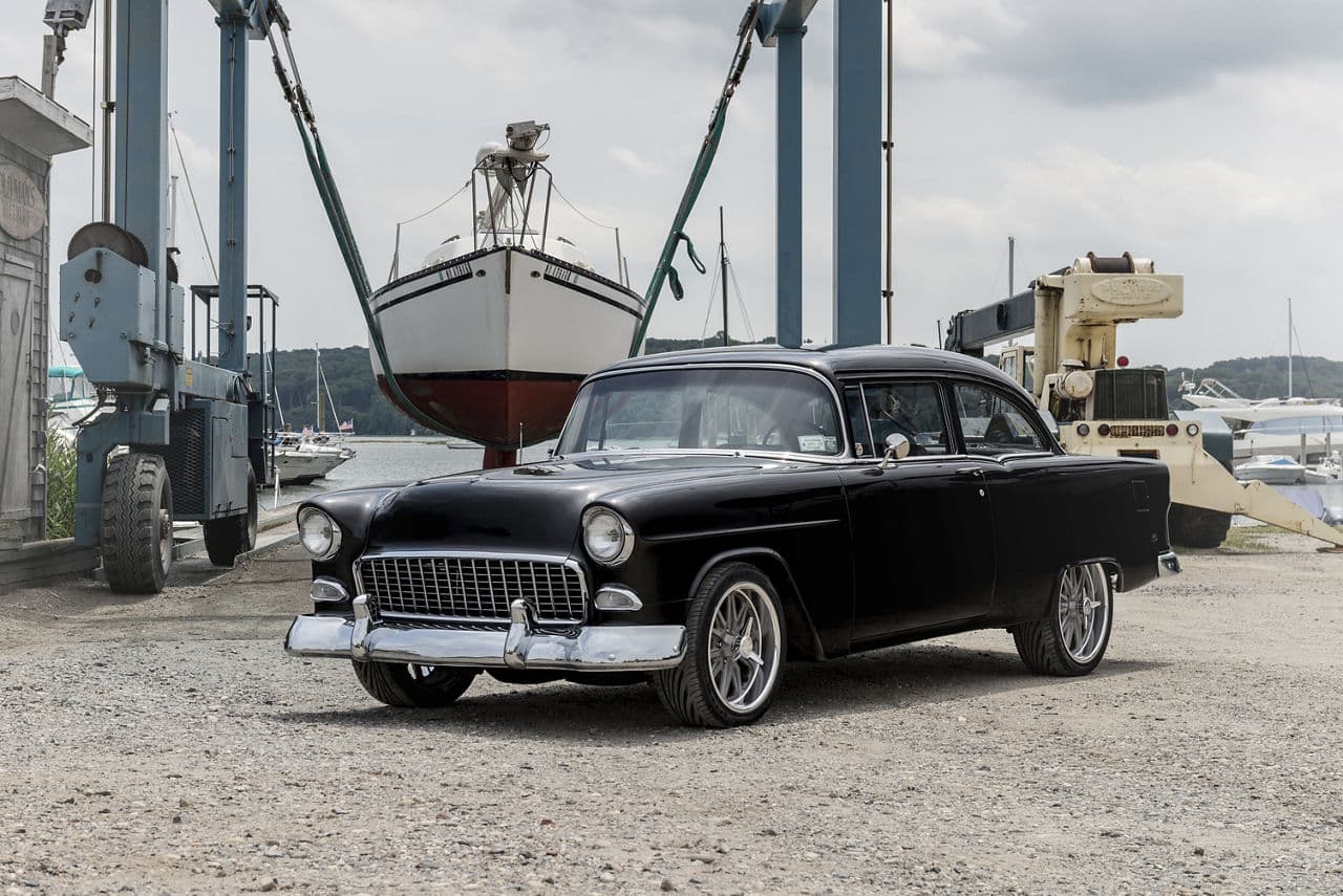 Side profile of 1955 Chevrolet Bel Air with wheels