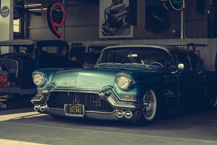 Front view of 1957 Cadillac Coupe DeVille with wheels