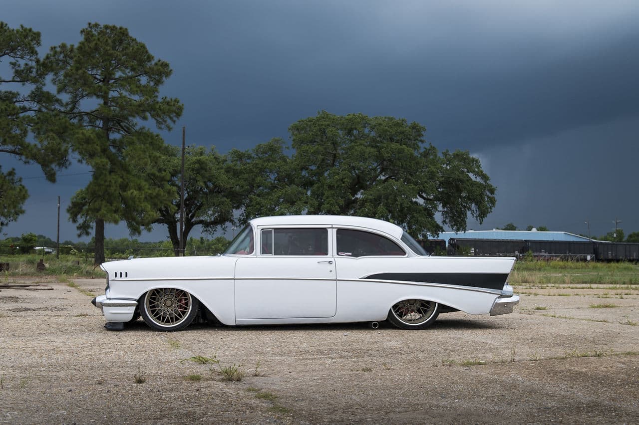 Side profile of 1957 Chevrolet Delray with wheels