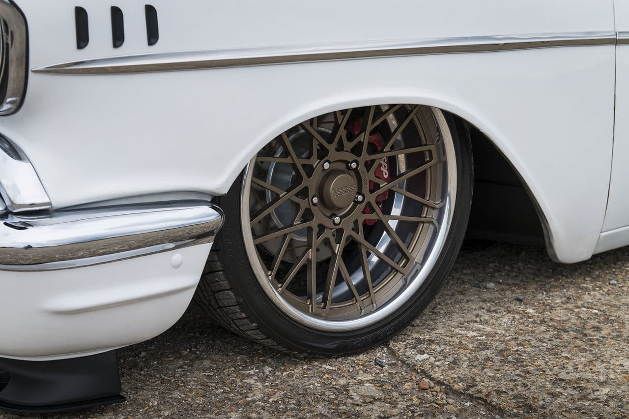 Detail view of 1957 Chevrolet Delray with wheels