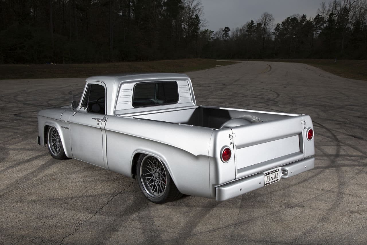 Side profile of 1962 Dodge D100 with wheels