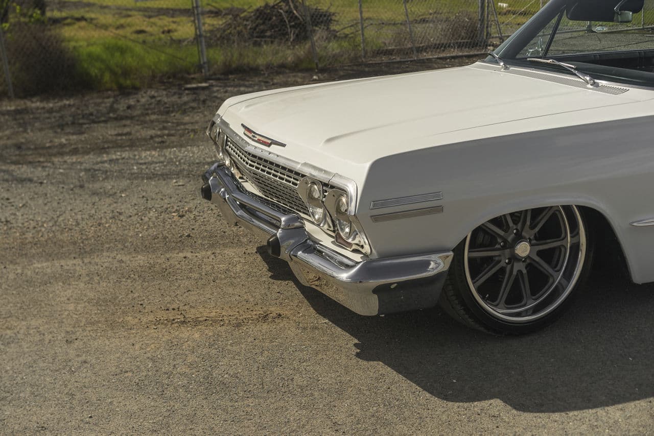 Side profile of 1963 Chevrolet Impala with wheels