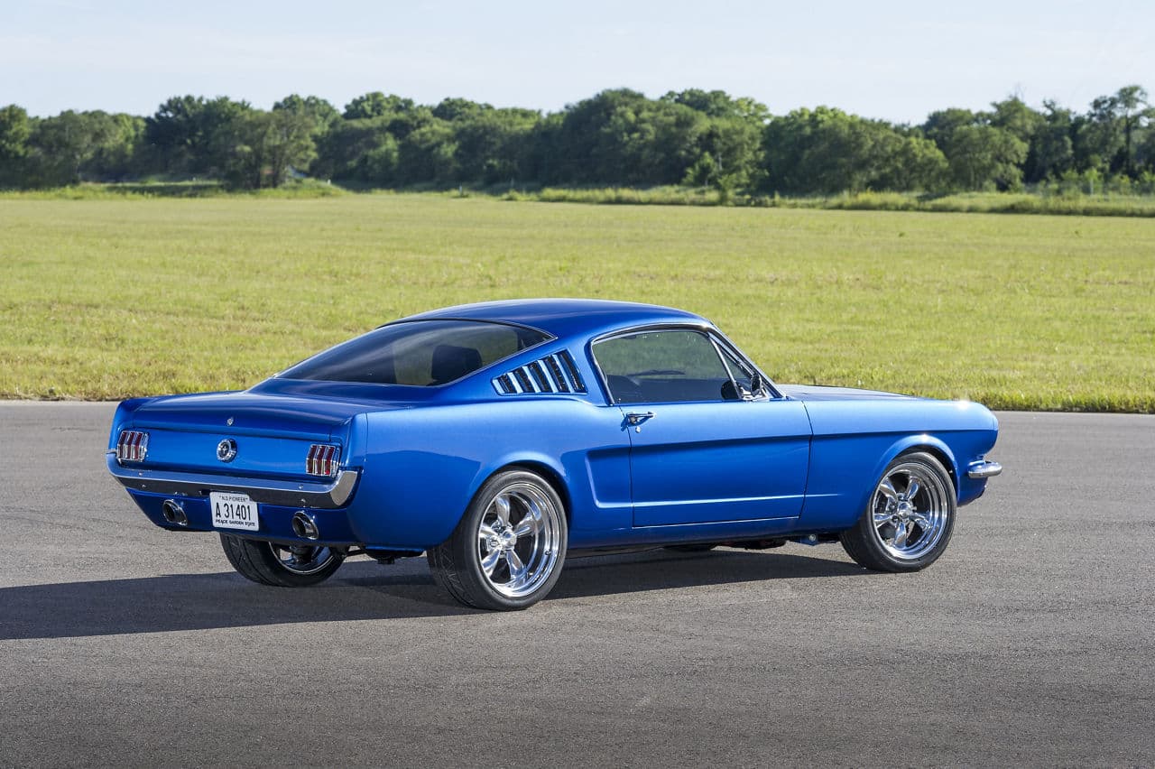 Side profile of 1965 Ford Mustang with wheels