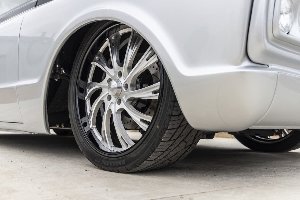 Detail view of 1968 GMC C10 with wheels