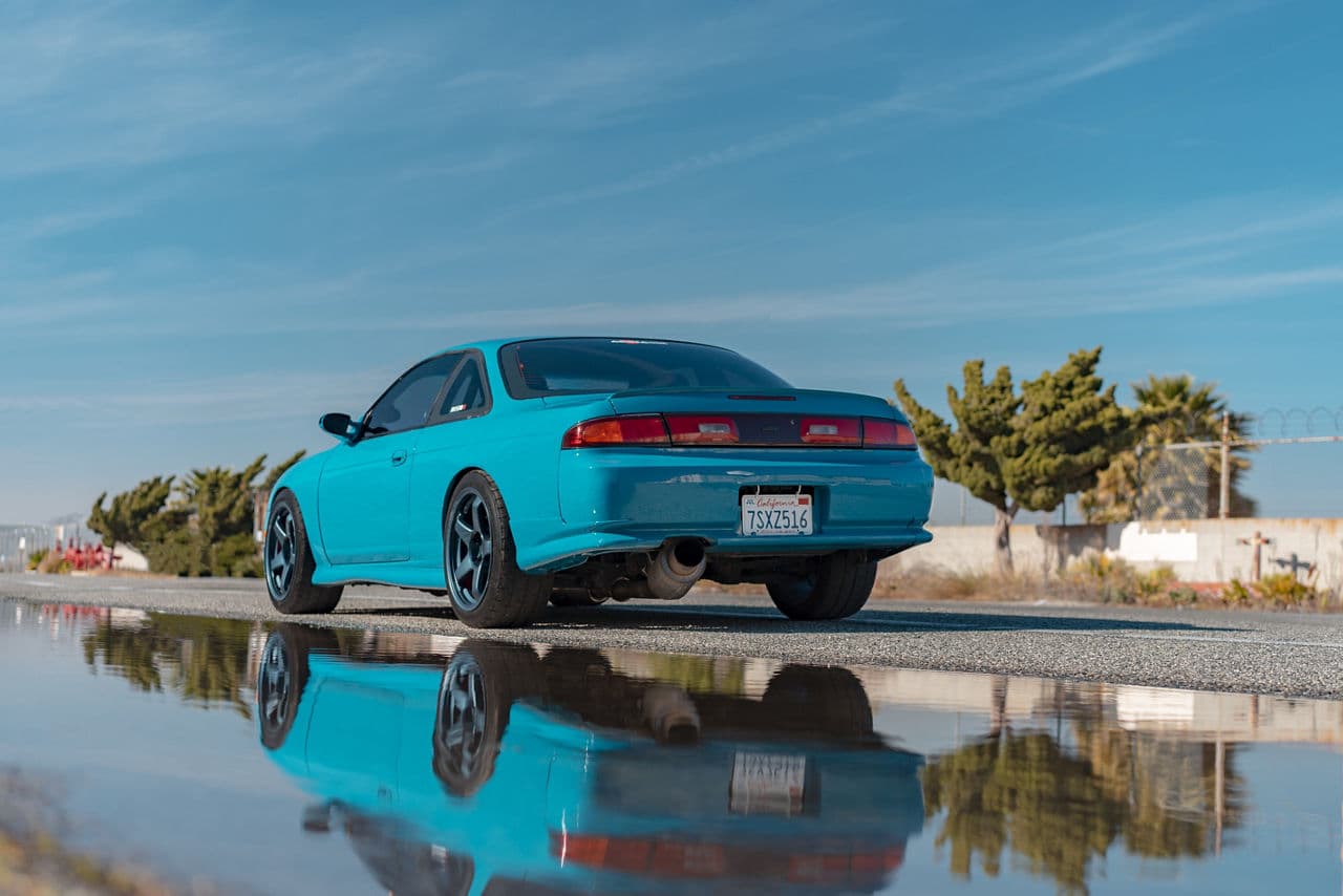 Side profile of 1995 Nissan 240SX with wheels