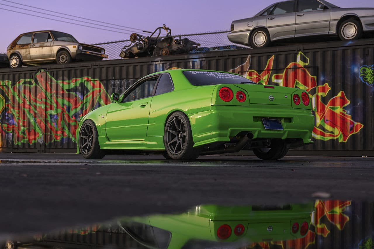 Interior of 1995 Nissan R34 Skyline with tuner wheels