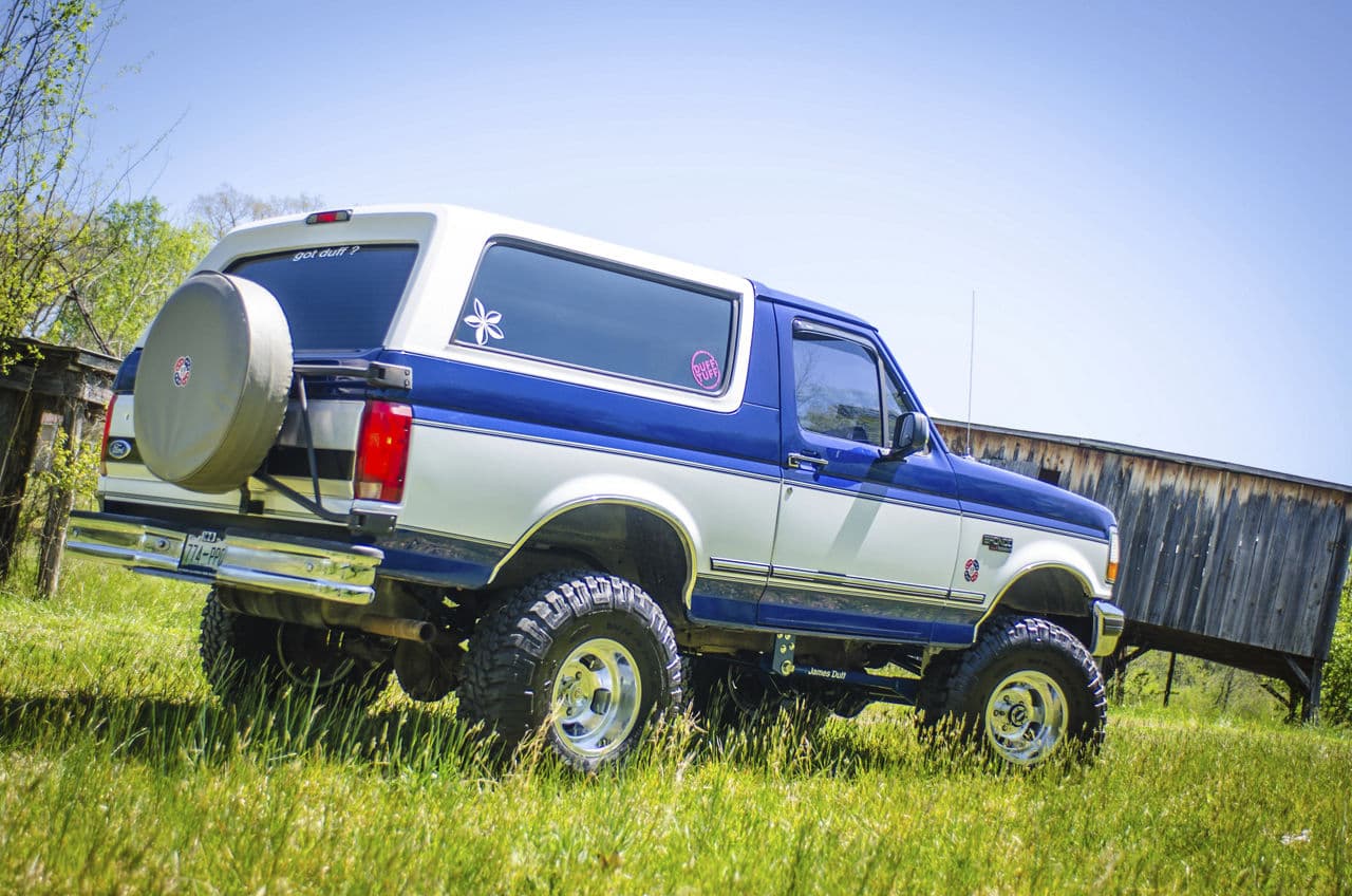 Side profile of 1996 Ford Bronco with truck suv wheels