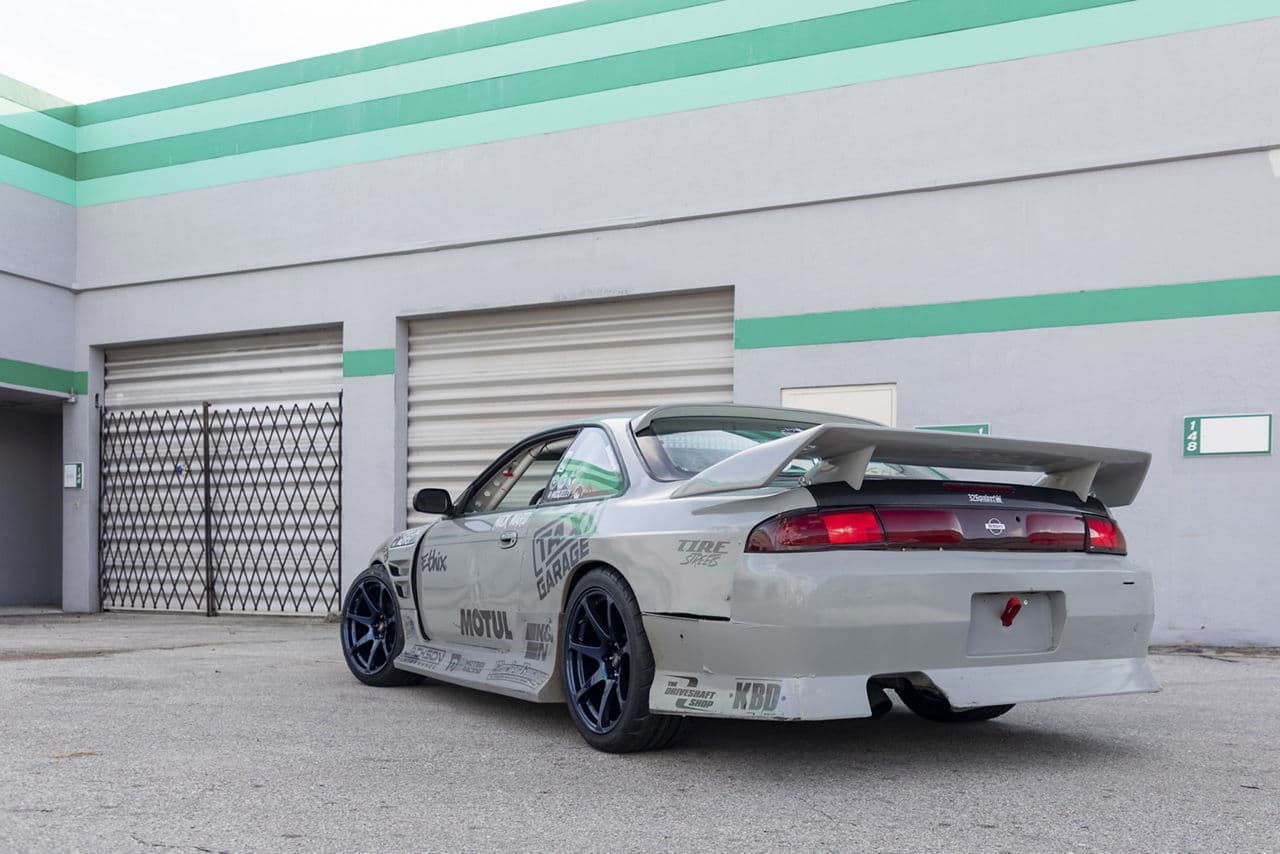 Side profile of 1996 Nissan 240SX with wheels