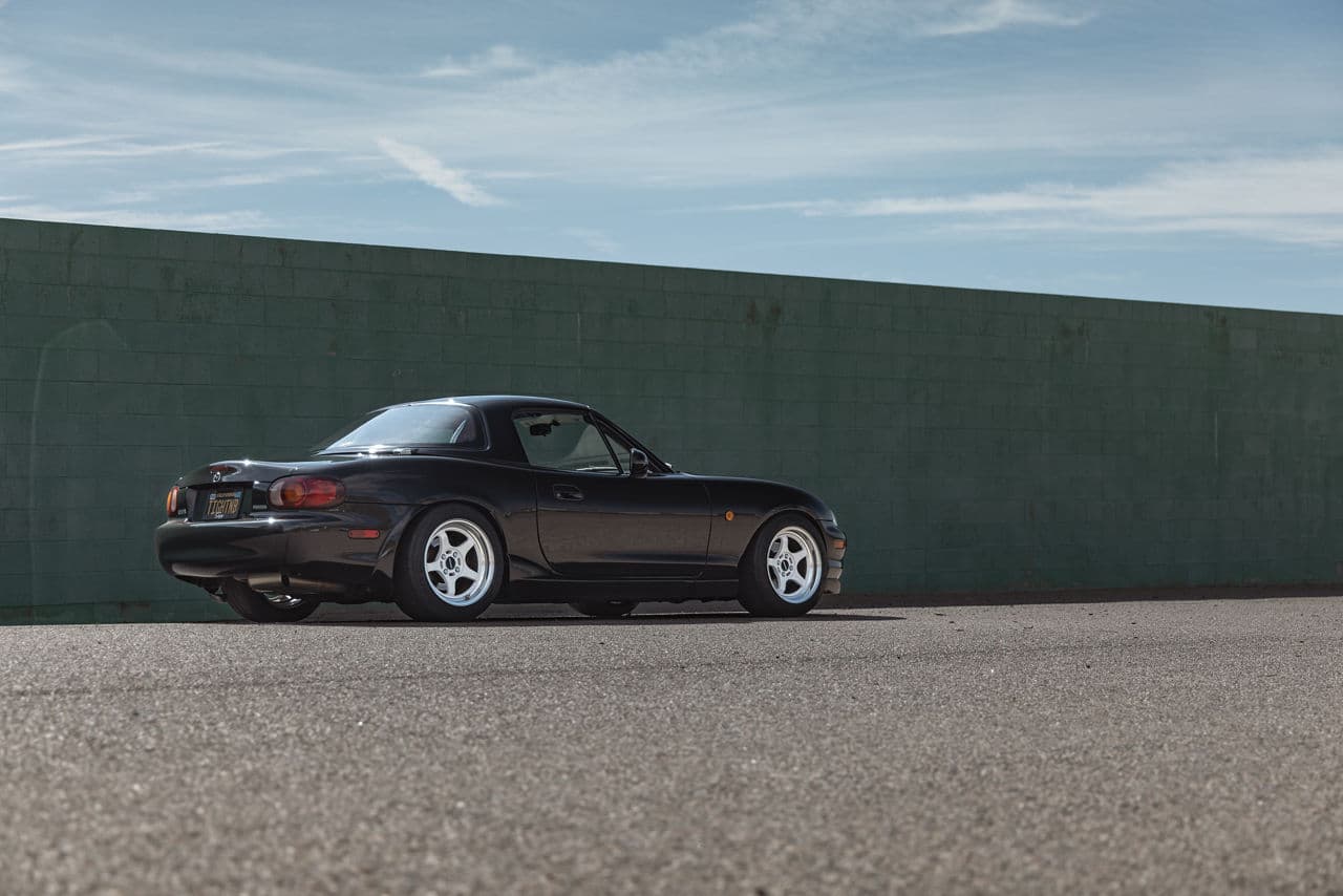 Rear view of 1998 Mazda Miata with wheels
