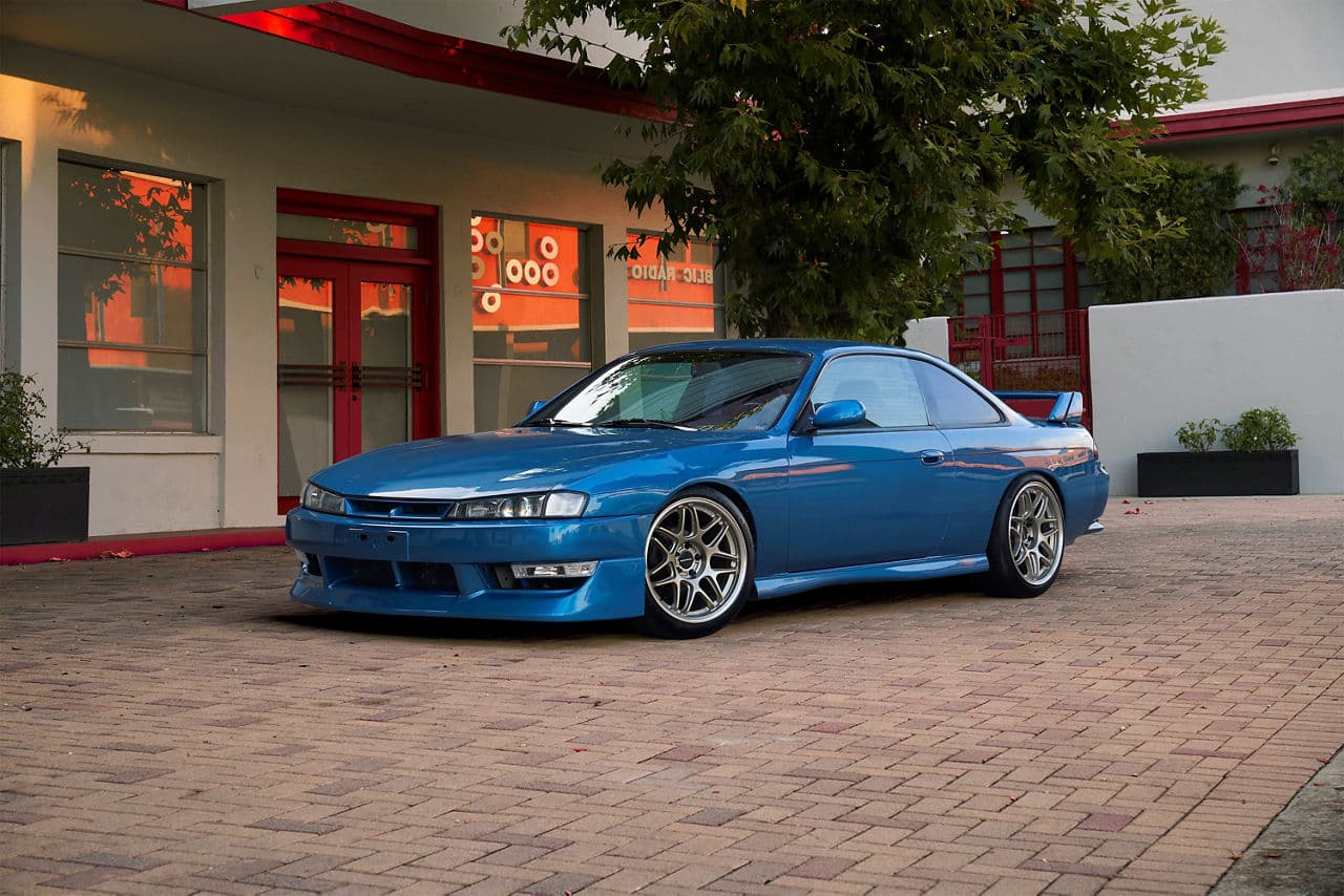 Front view of 1998 Nissan 240SX with vehicle wraps