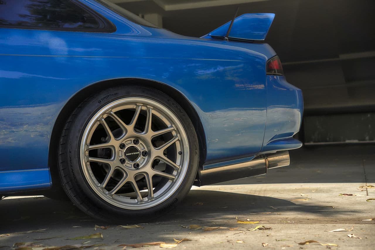Interior of 1998 Nissan 240SX with vehicle wraps