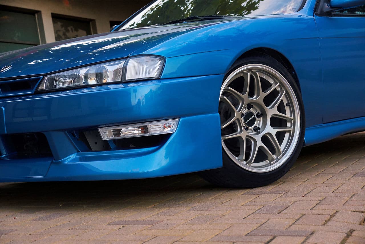 Detail view of 1998 Nissan 240SX with vehicle wraps