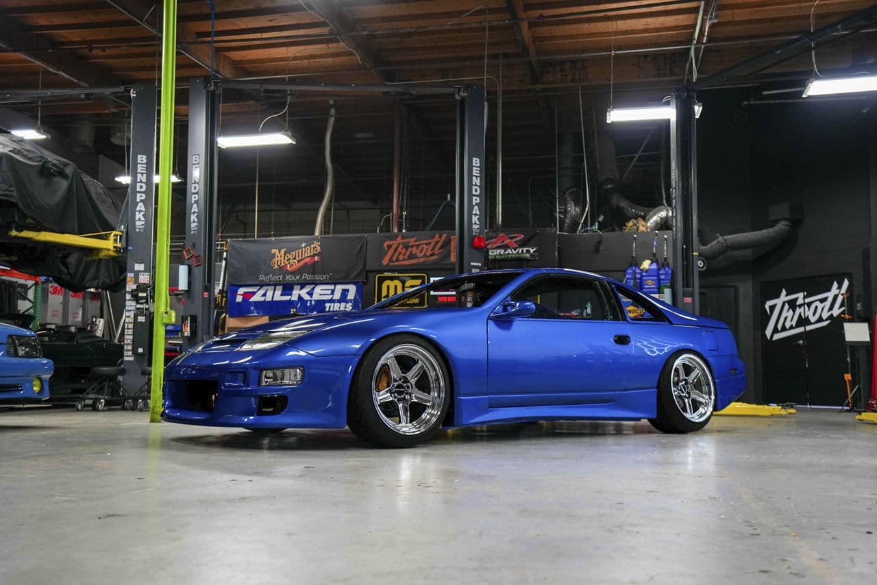 Rear view of 1999 Nissan 300ZX with tuner wheels