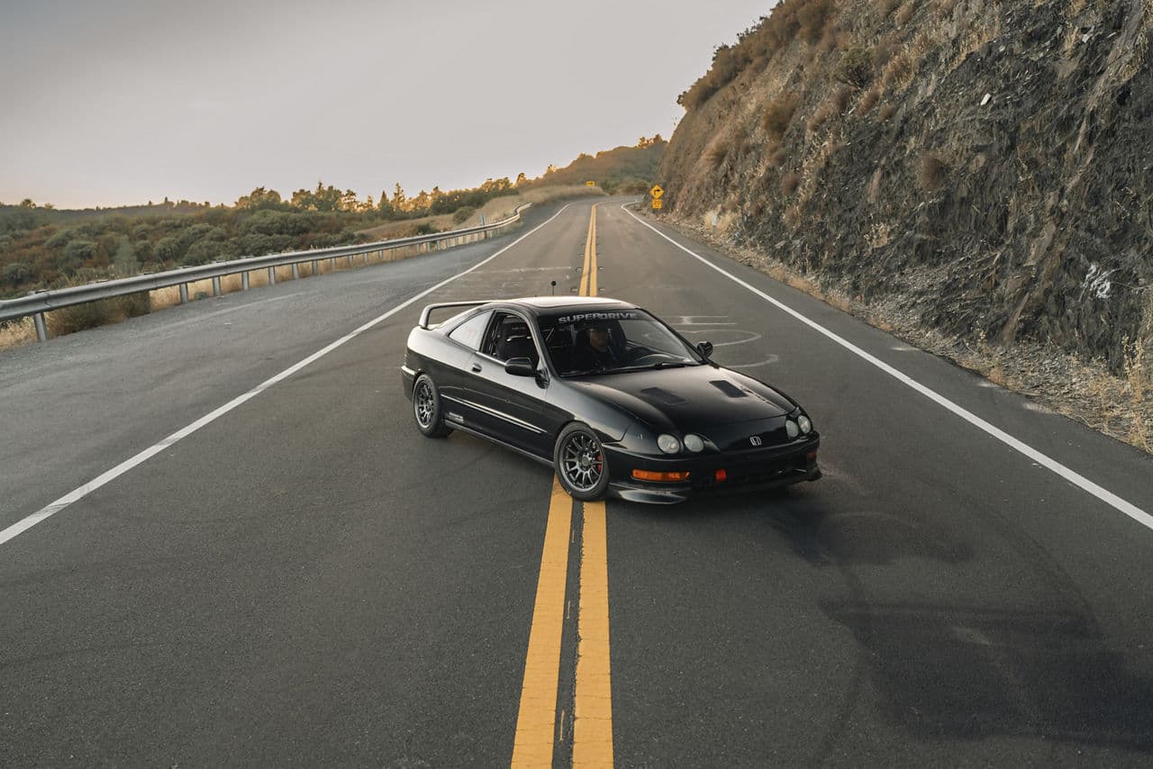 Side profile of 2000 Acura Integra with wheels