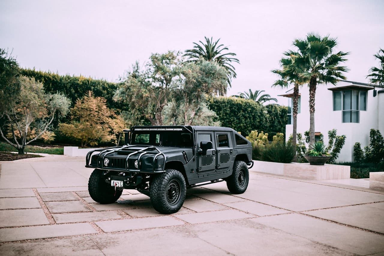 Front view of 2003 Hummer H1 with truck suv wheels