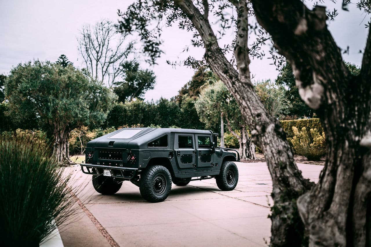 Side profile of 2003 Hummer H1 with truck suv wheels