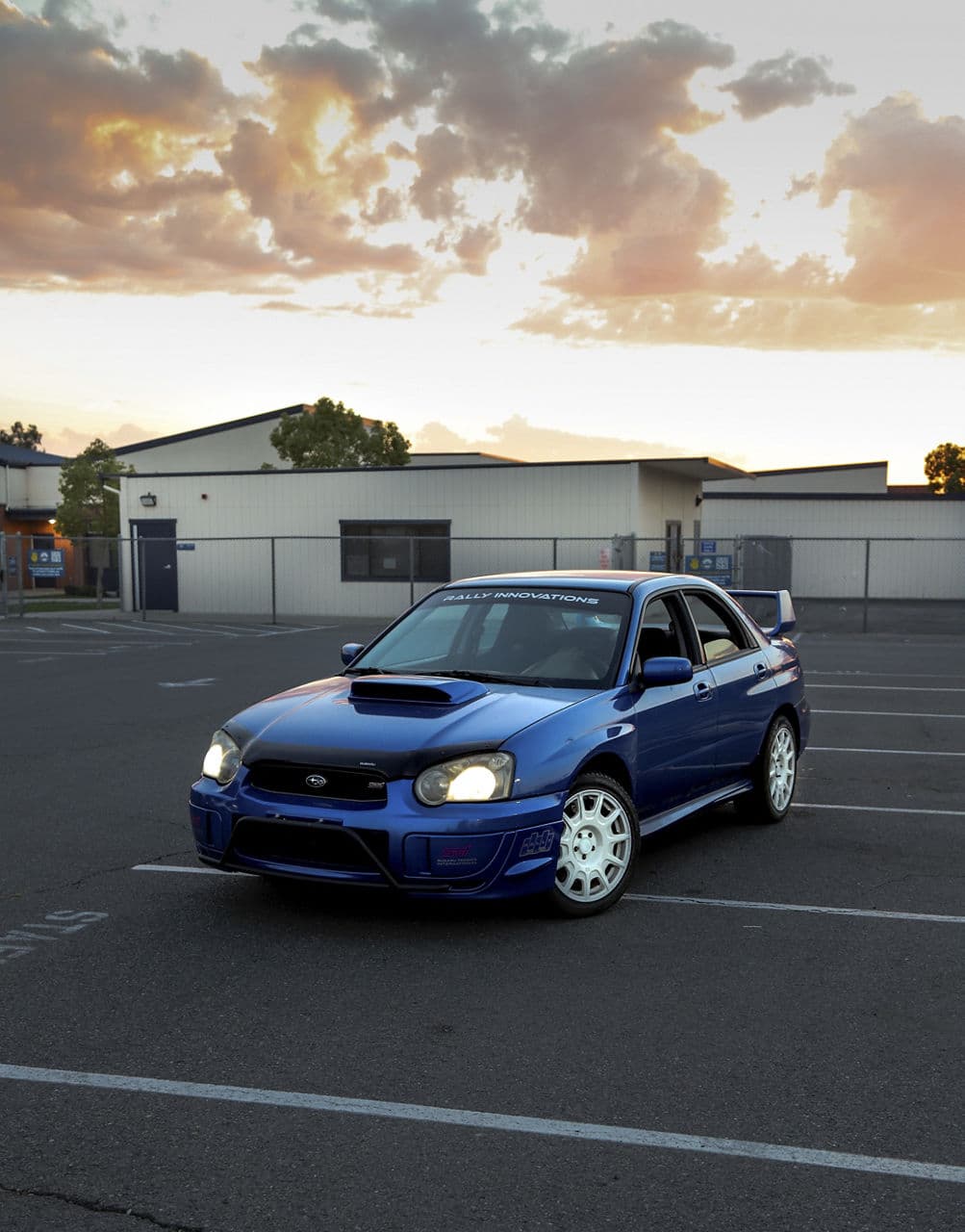 Side profile of 2004 Subaru WRX STI with wheels