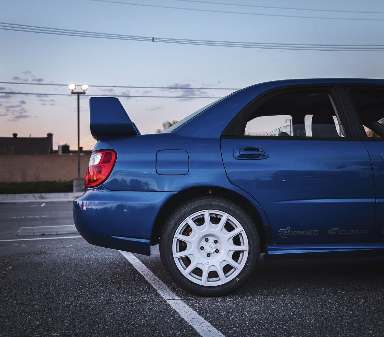 Rear view of 2004 Subaru WRX STI with wheels