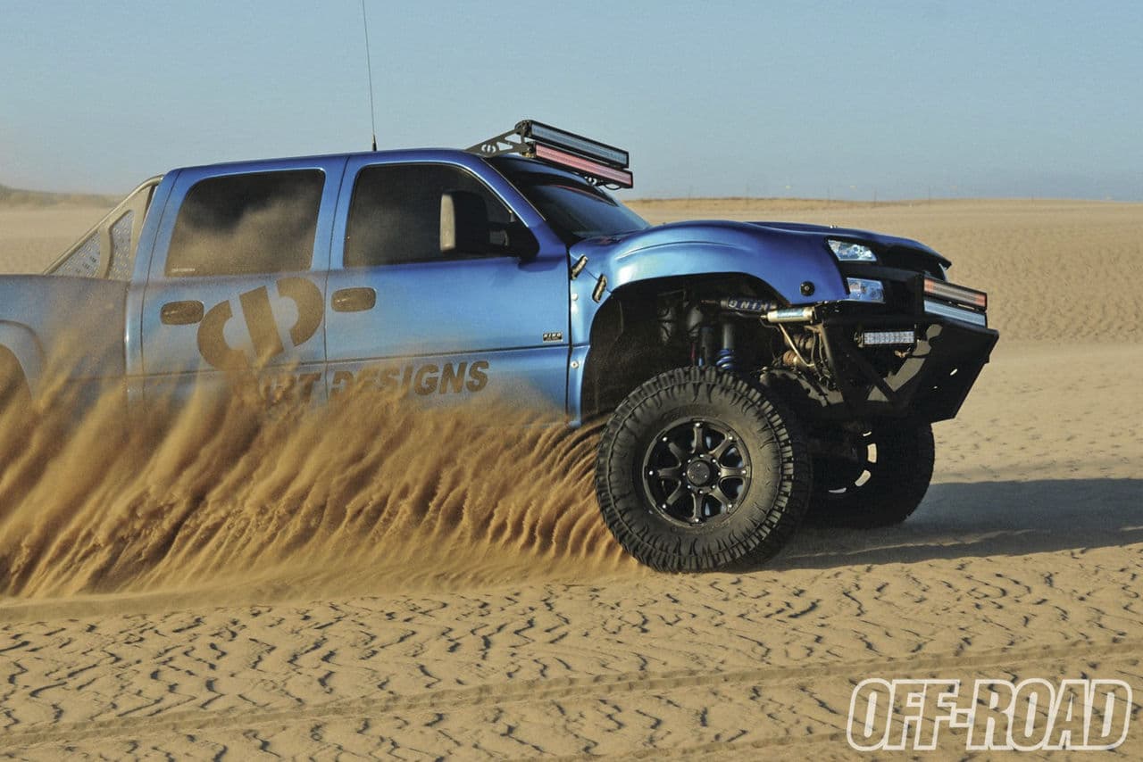 Side profile of 2006 Chevrolet Silverado 2500 with truck suv wheels