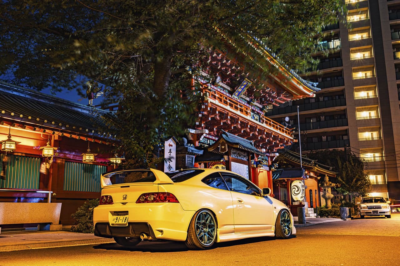 Rear view of 2006 Honda Integra with vehicle wraps