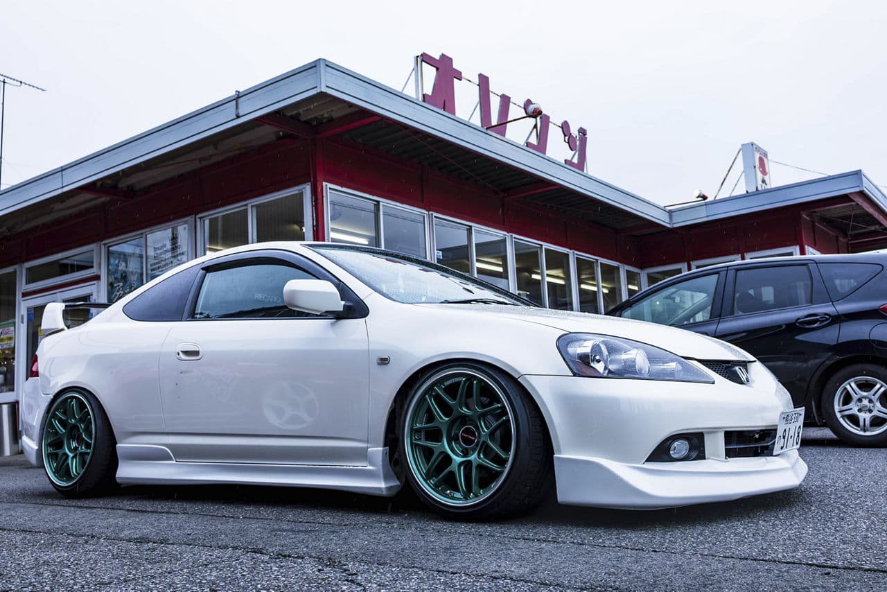 Detail view of 2006 Honda Integra with vehicle wraps