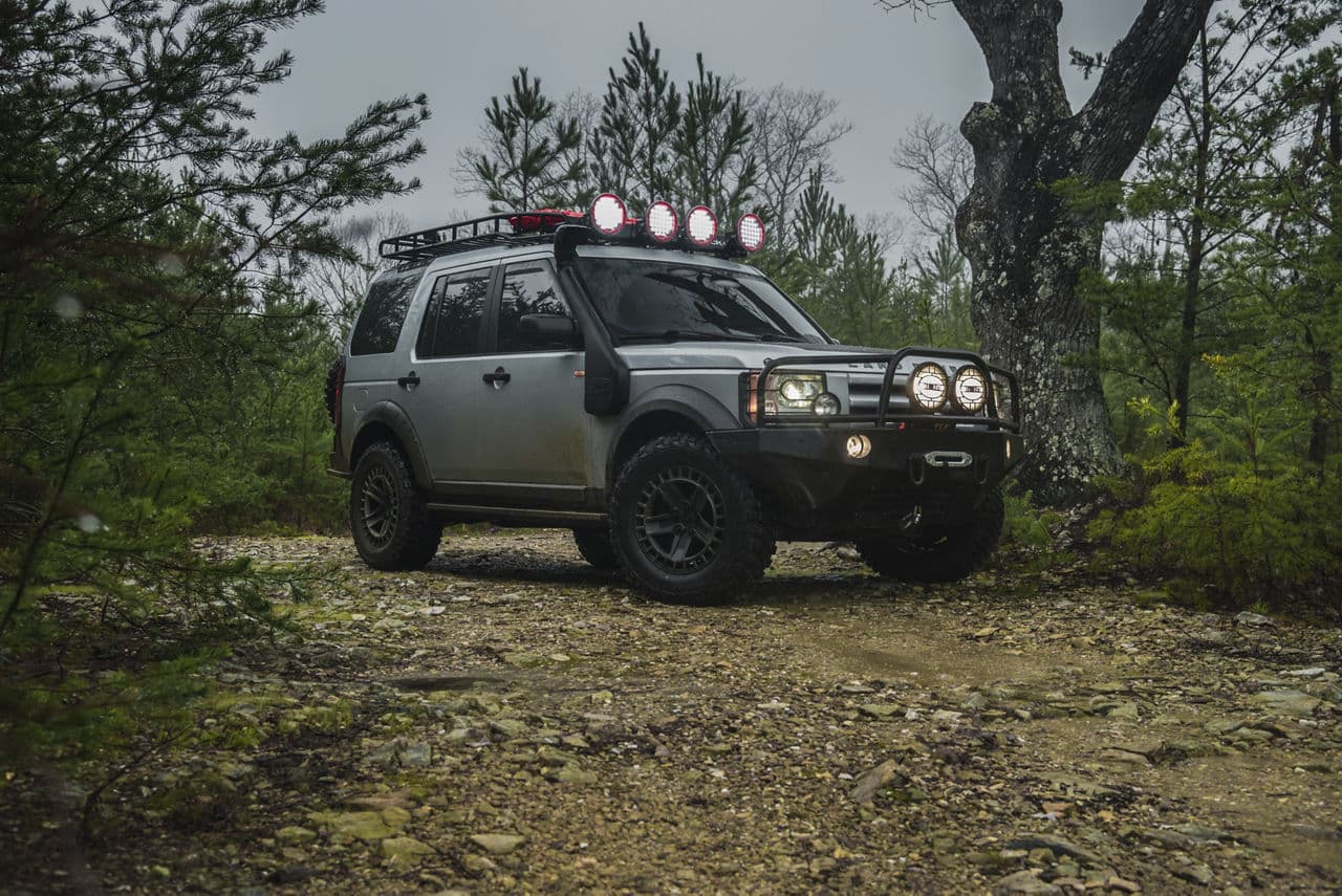 Front view of 2009 Land Rover Defender with truck suv wheels