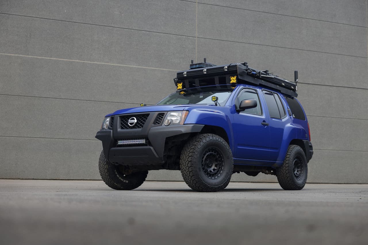 Front view of 2009 Nissan XTerra with wheels