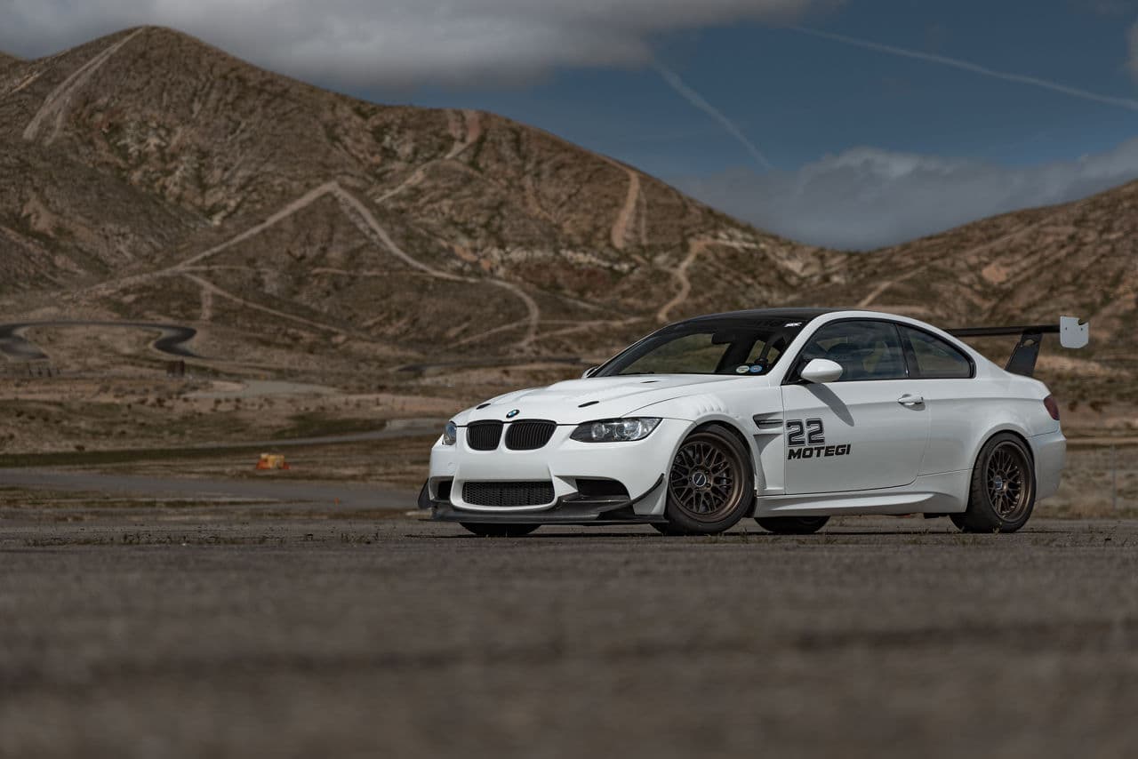 Front view of 2010 BMW M3 with tuner wheels