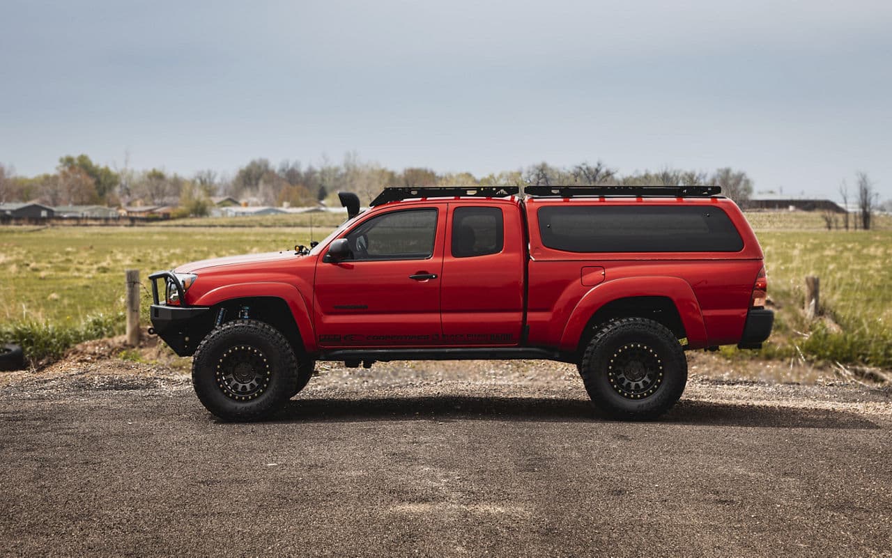 Side profile of 2010 Toyota Tacoma with truck suv wheels