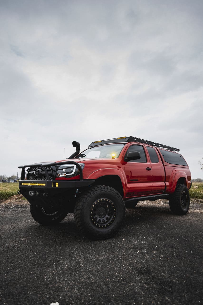 Rear view of 2010 Toyota Tacoma with truck suv wheels