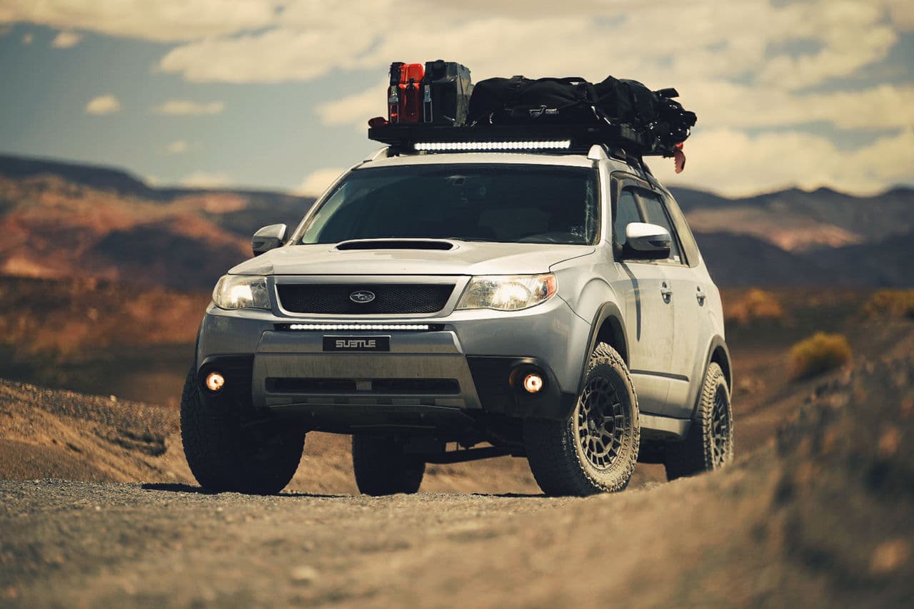 Side profile of 2011 Subaru Forester with wheels