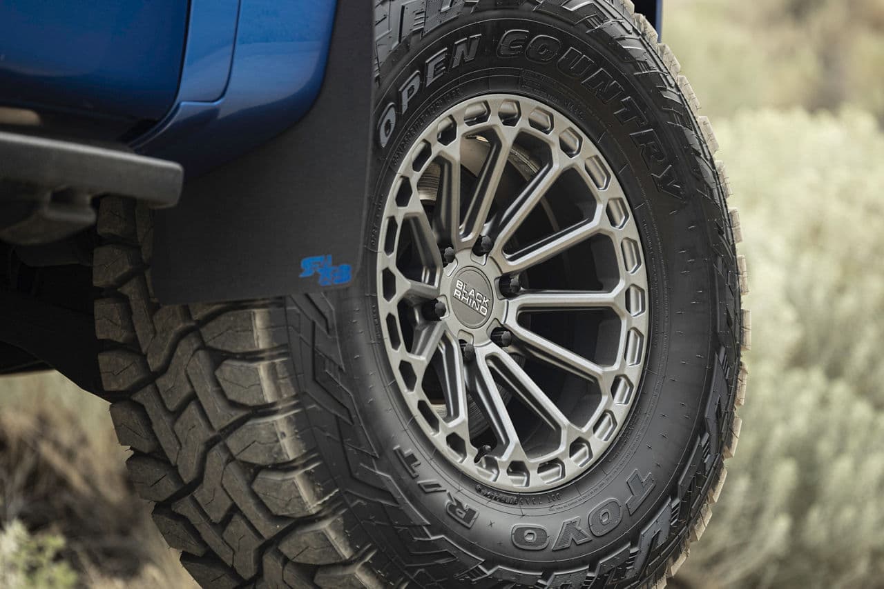 Detail view of 2012 Ford F150 Raptor with truck suv wheels