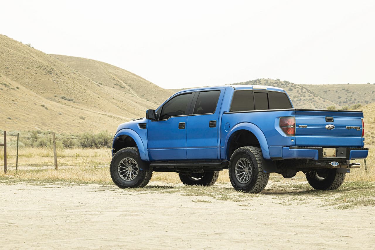 Rear view of 2012 Ford F150 Raptor with truck suv wheels