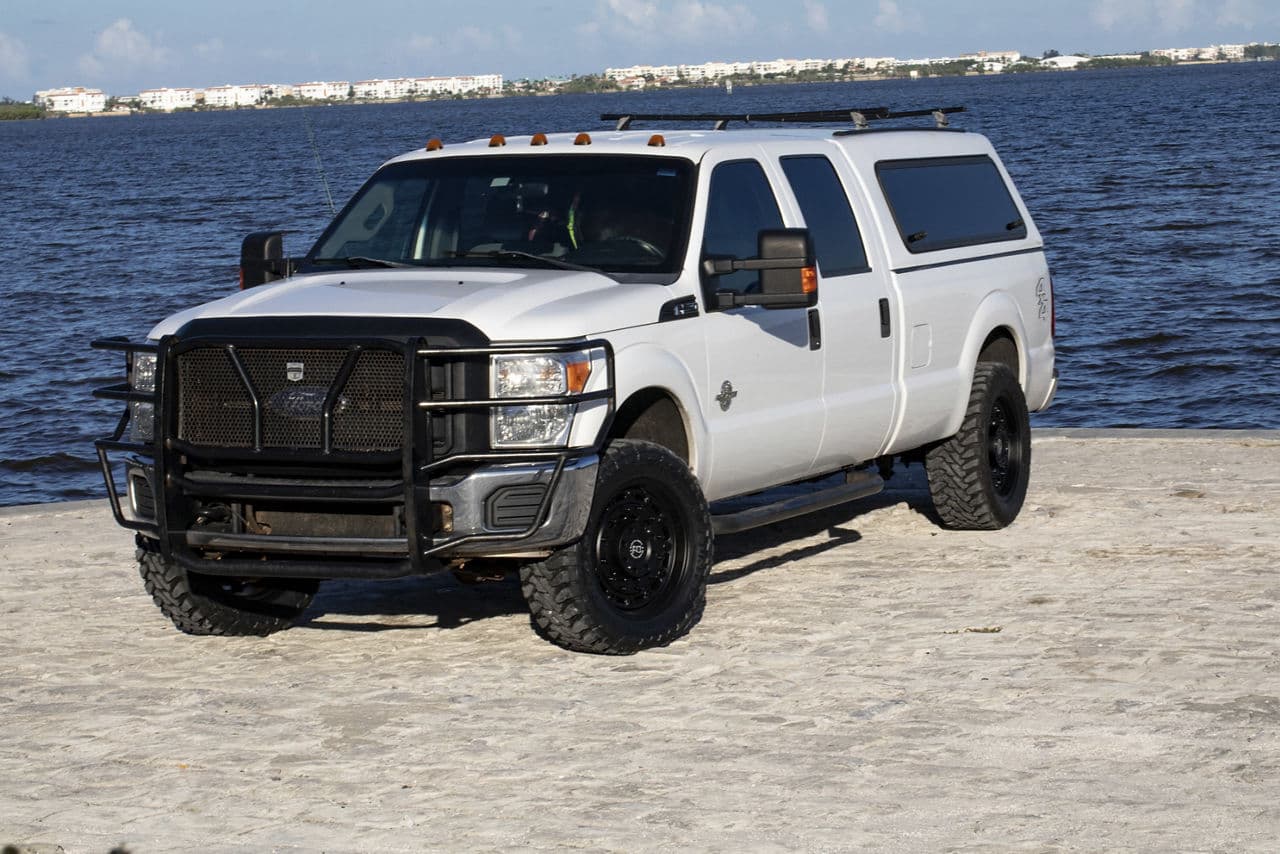 Rear view of 2012 Ford F250 with truck suv wheels