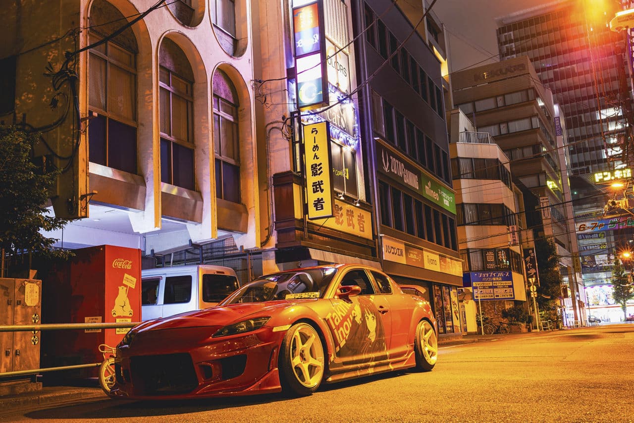 Side profile of 2012 Mazda RX-8 with wheels