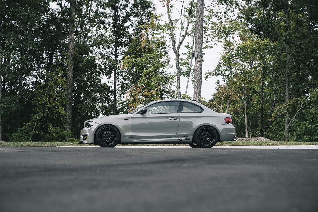 Side profile of 2013 BMW 128i with wheels