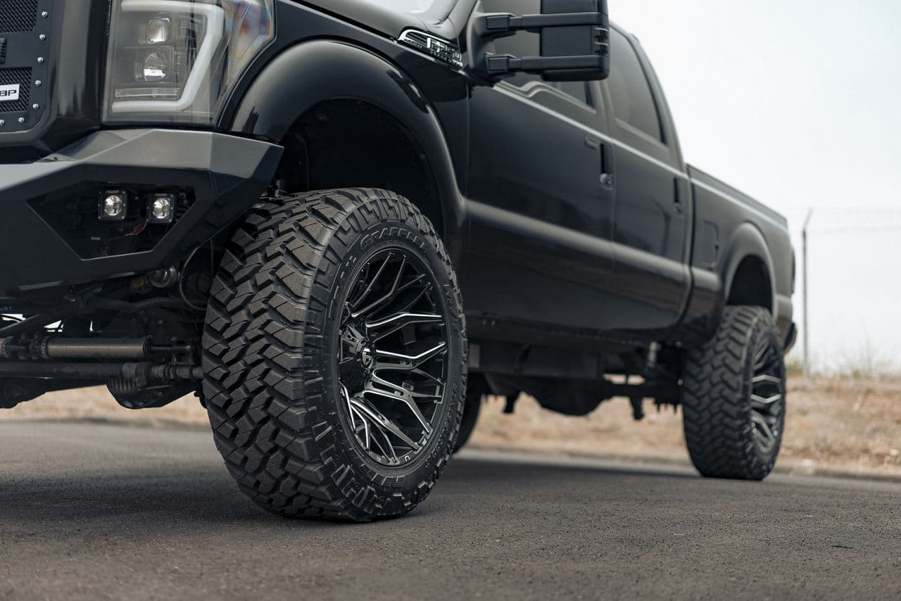 Rear view of 2013 Ford F250 with truck suv wheels