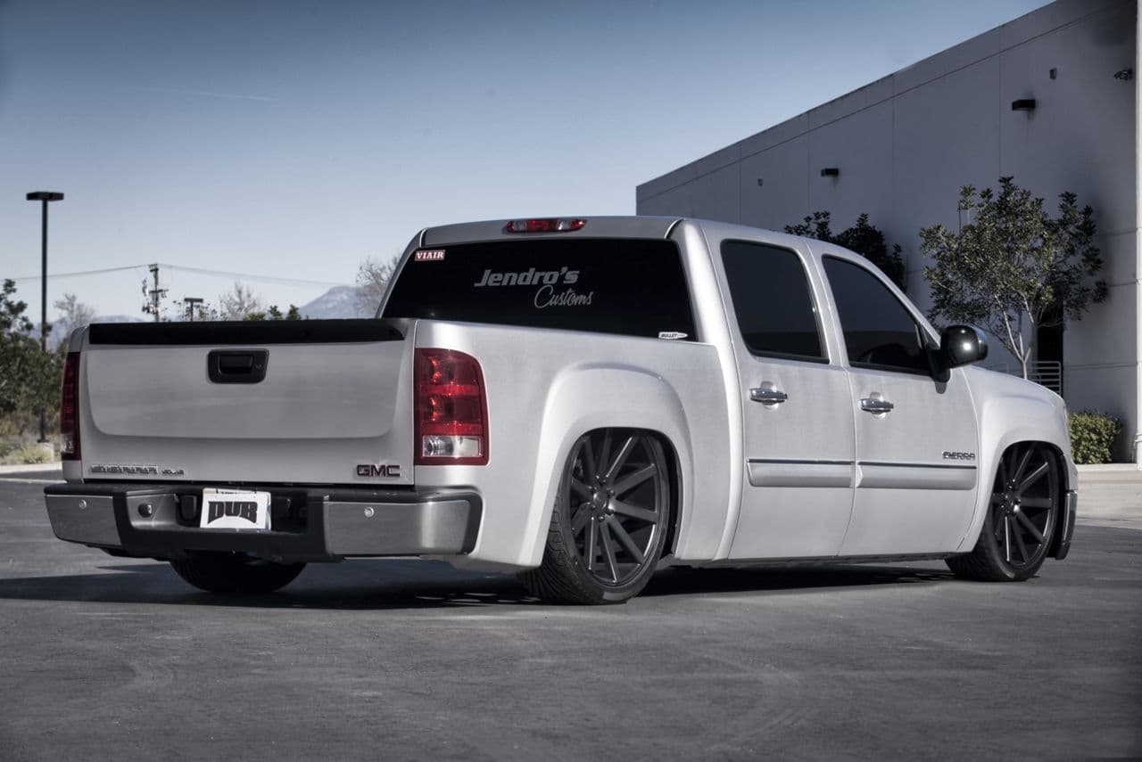 Rear view of 2013 GMC Sierra with wheels