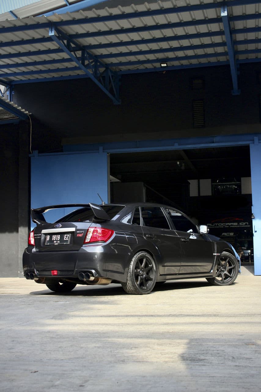 Front view of 2013 Subaru WRX STI with wheels