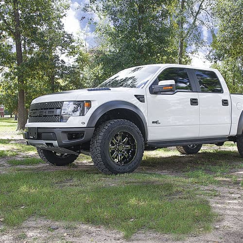 Rear view of 2014 Ford F150 Raptor with truck suv wheels