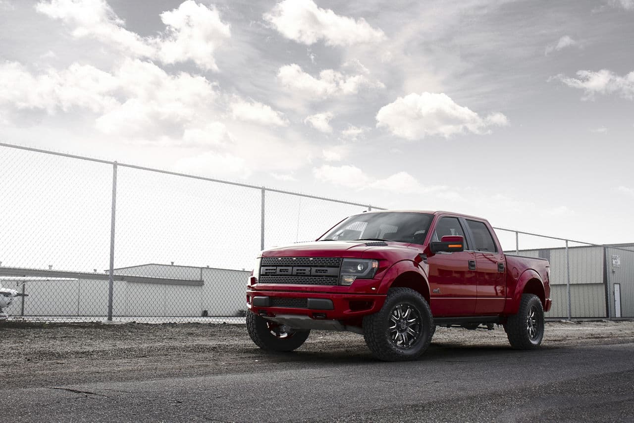 Side profile of 2014 Ford F150 Raptor with truck suv wheels