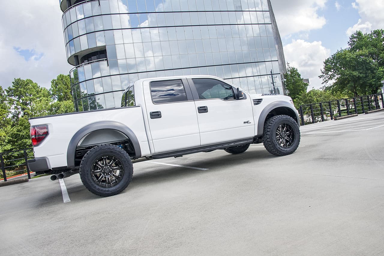 Rear view of 2014 Ford F150 Raptor with wheels