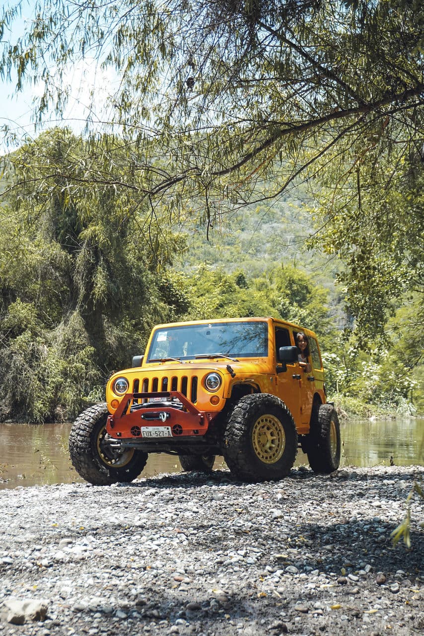Detail view of 2014 Jeep Wrangler with truck suv wheels