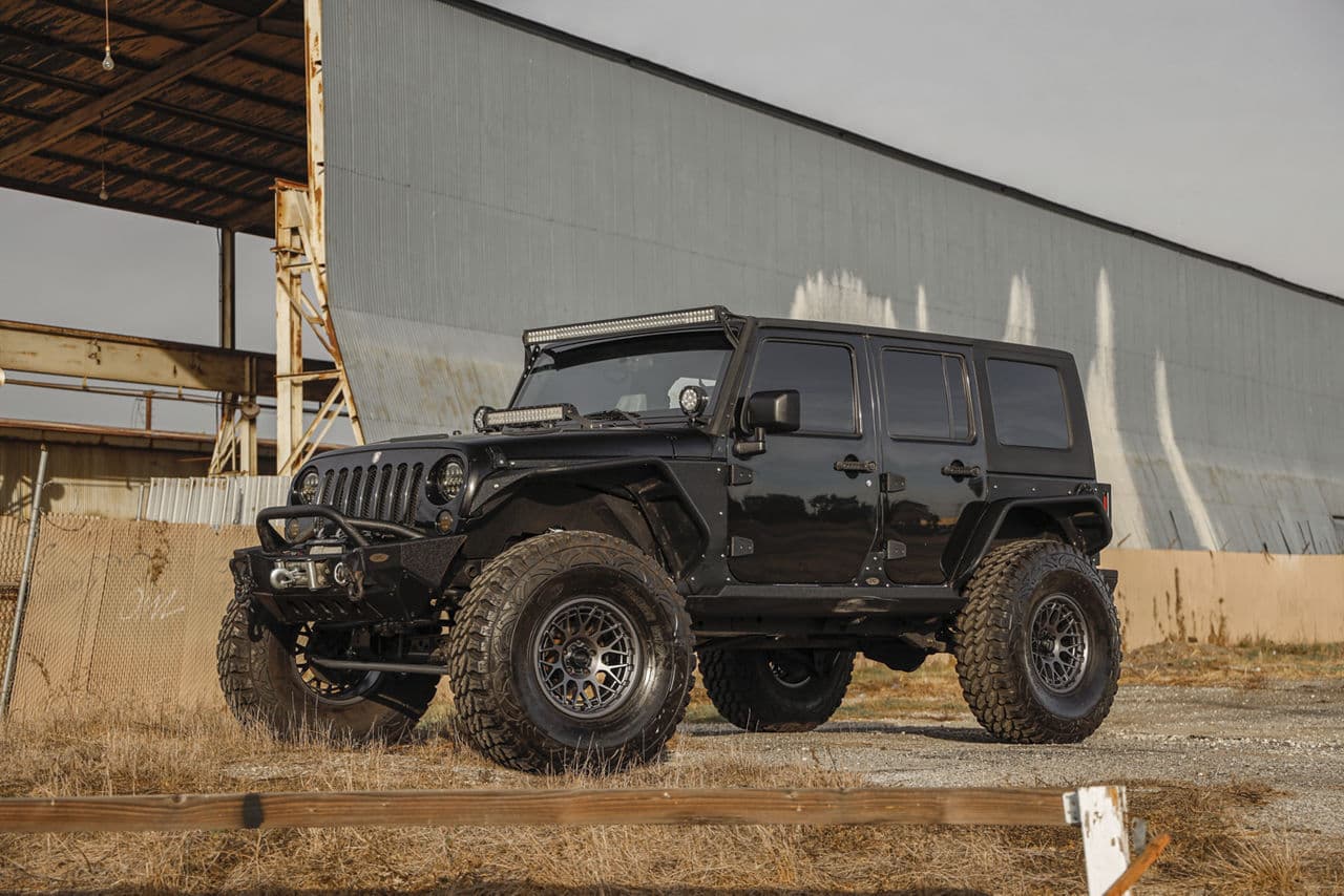 Rear view of 2014 Jeep Wrangler with wheels