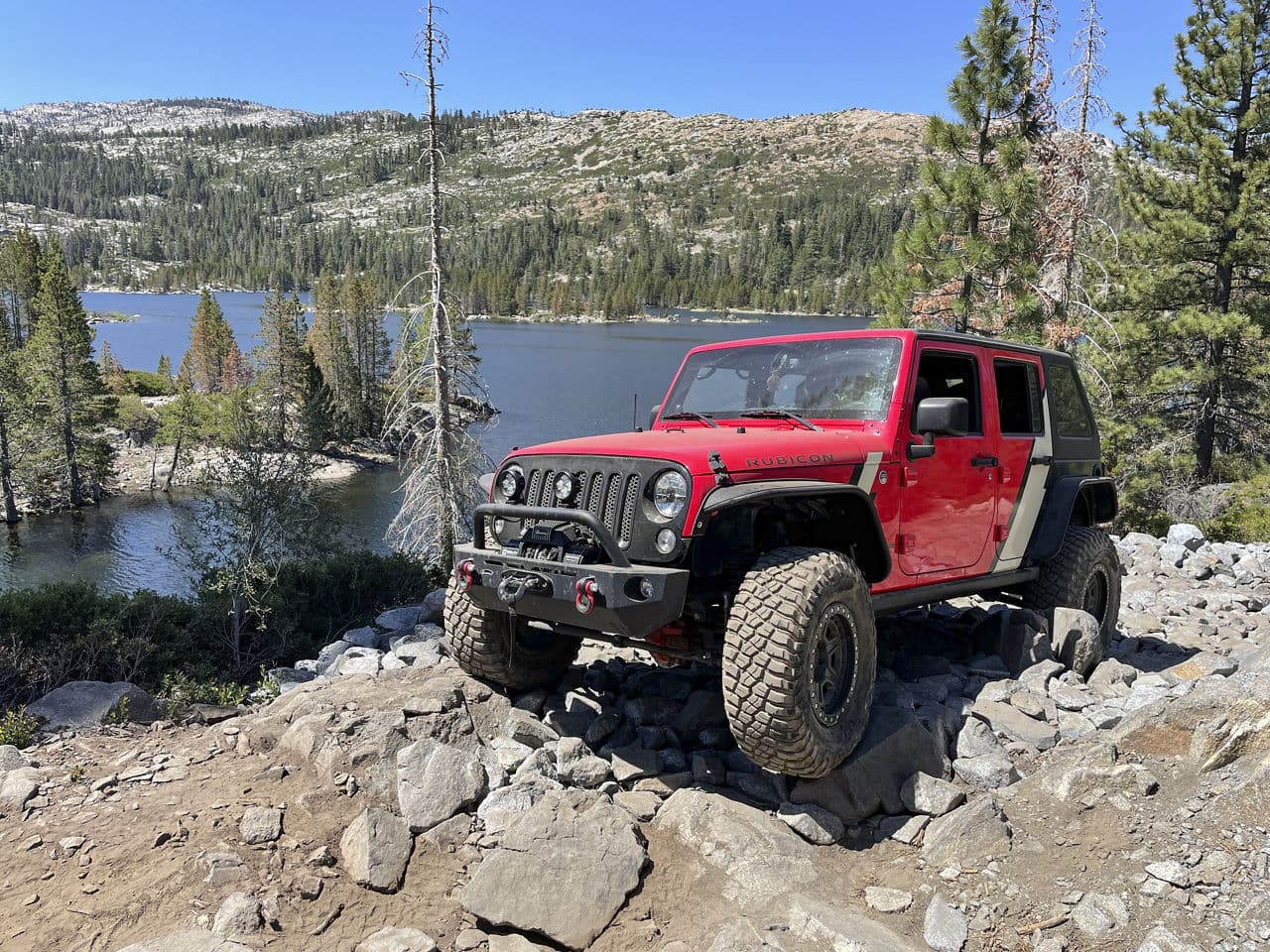 Side profile of 2014 Jeep Wrangler with wheels