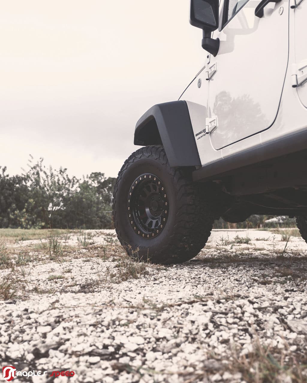 Detail view of 2014 Jeep Wrangler Willys with truck suv wheels