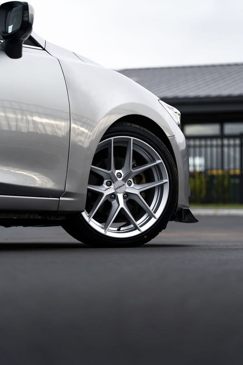 Rear view of 2014 Mazda 3 with wheels