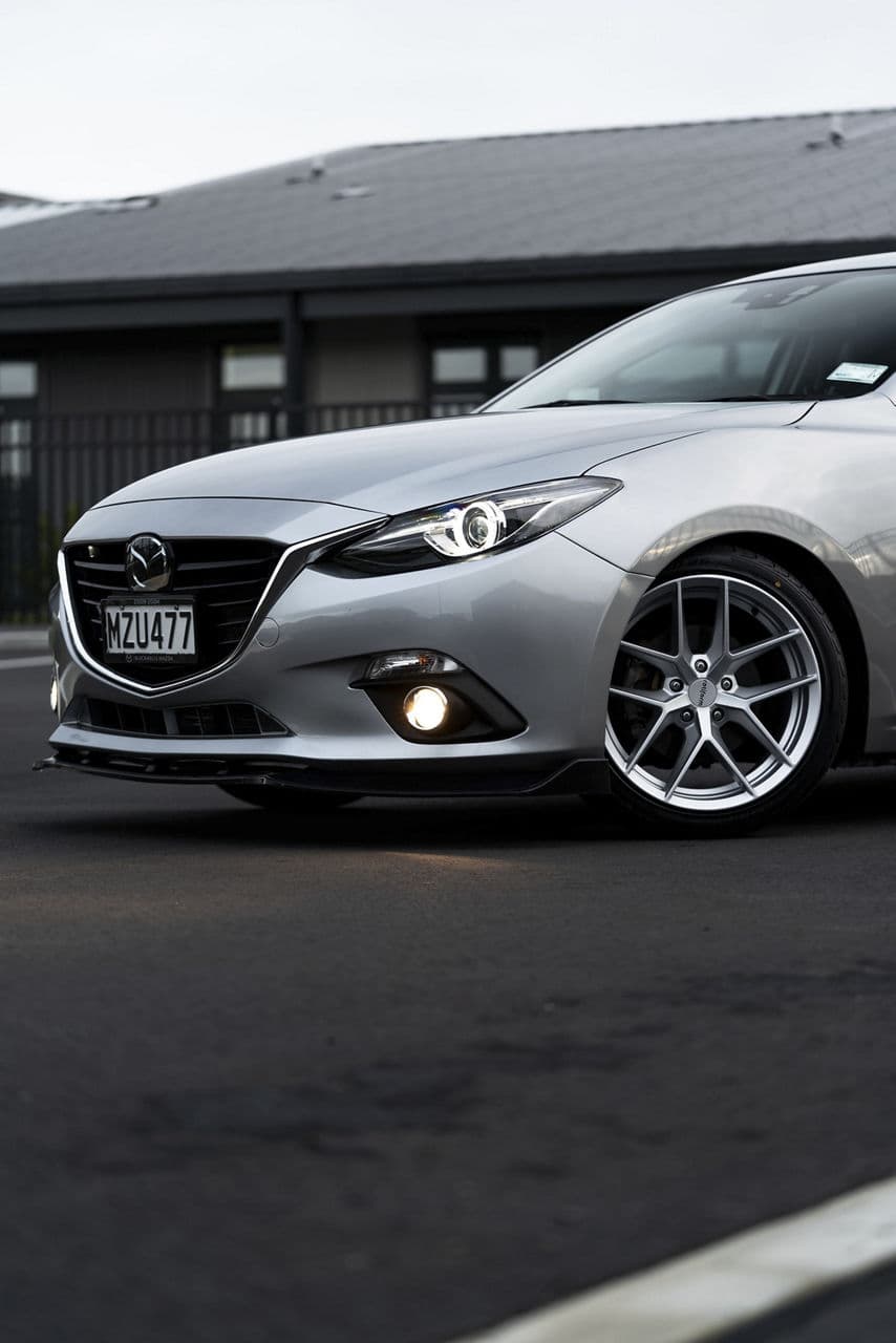 Detail view of 2014 Mazda 3 with wheels